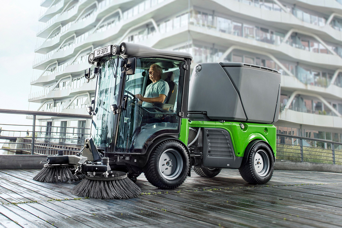 Importance of street sweepers, man riding Euromec's Powerflex street sweeper.